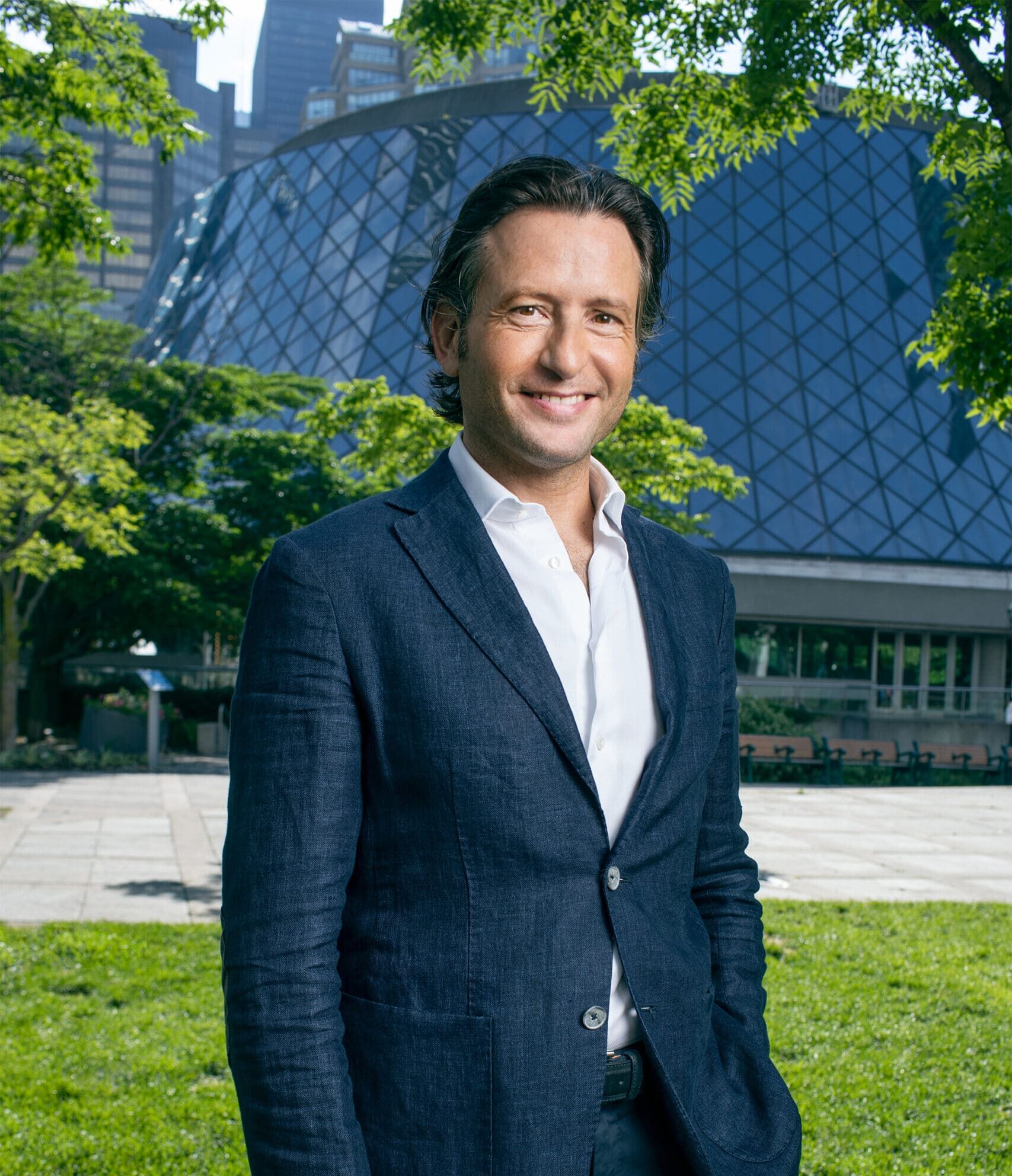 Gustavo Gimeno standing outside of Roy Thomson Hall