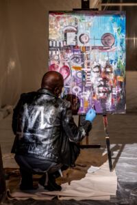 Photo by Dahlia Katz Moses Salihou painting in Improvisation as Life