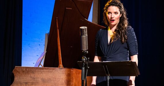 Photo of Mireille Asselin by Dahlia Katz Mireille Asselin singing at a music stand